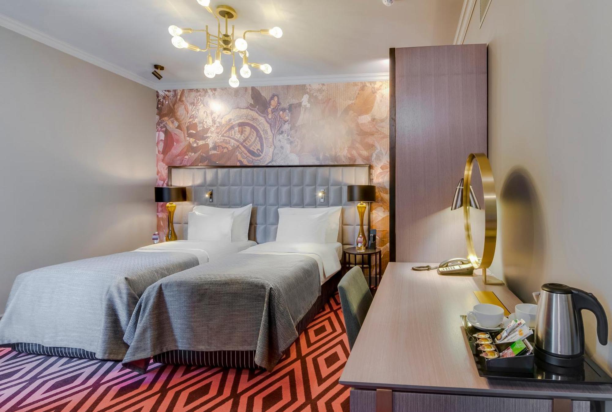 Grand Poet Hotel And Spa By Semarah Riga Exterior foto A room at the hotel