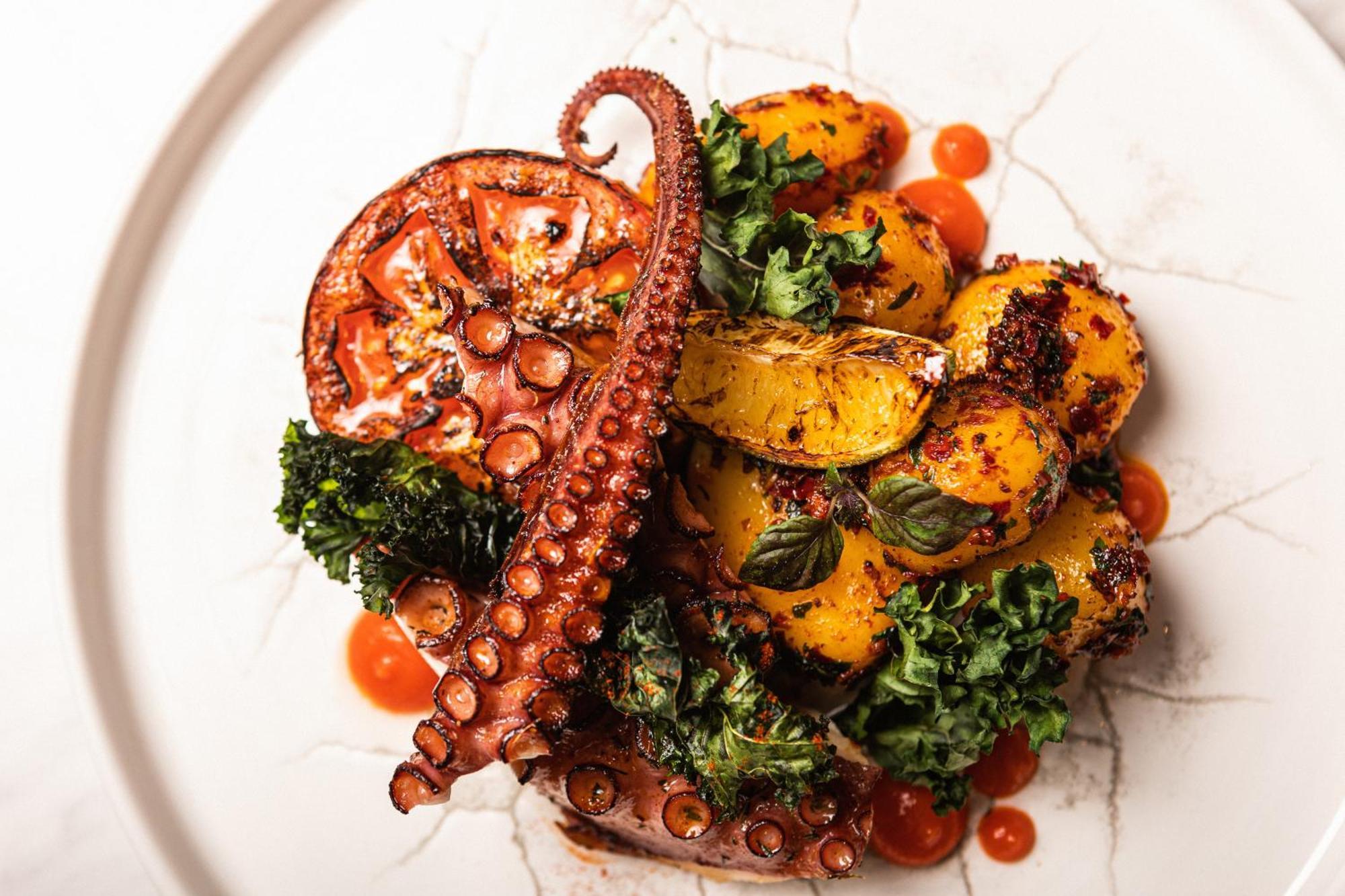 Grand Poet Hotel And Spa By Semarah Riga Exterior foto A prepared octopus dish